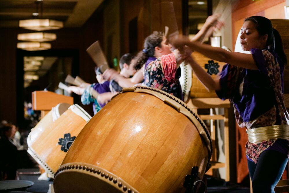 Taiko drummers performing on stage